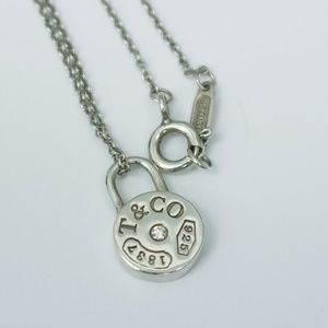 Vintage Tiffany & Co. Diamond Mini Round Lock Pendant
